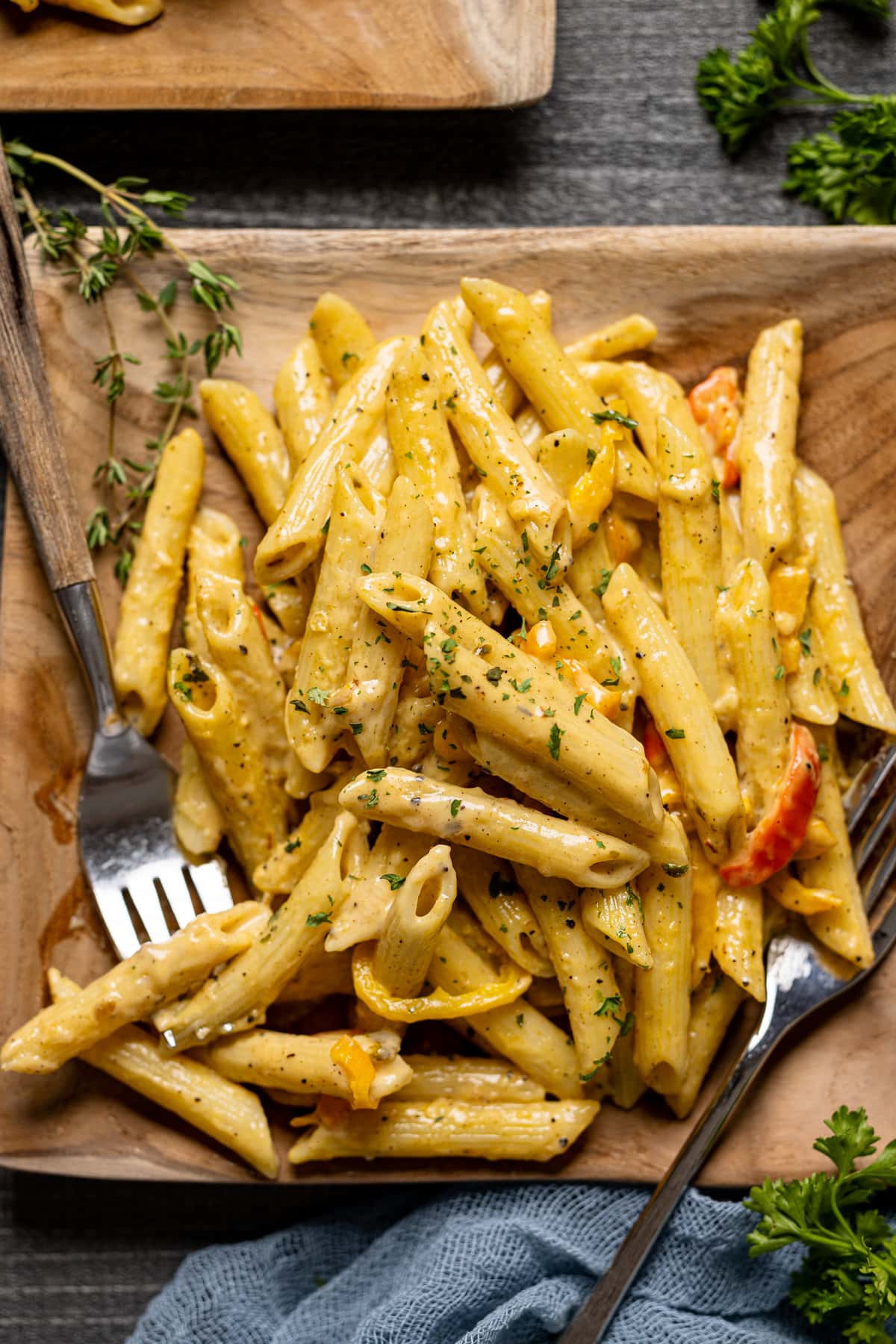 Plate of Creamy Jamaican Rasta Pasta with two forks