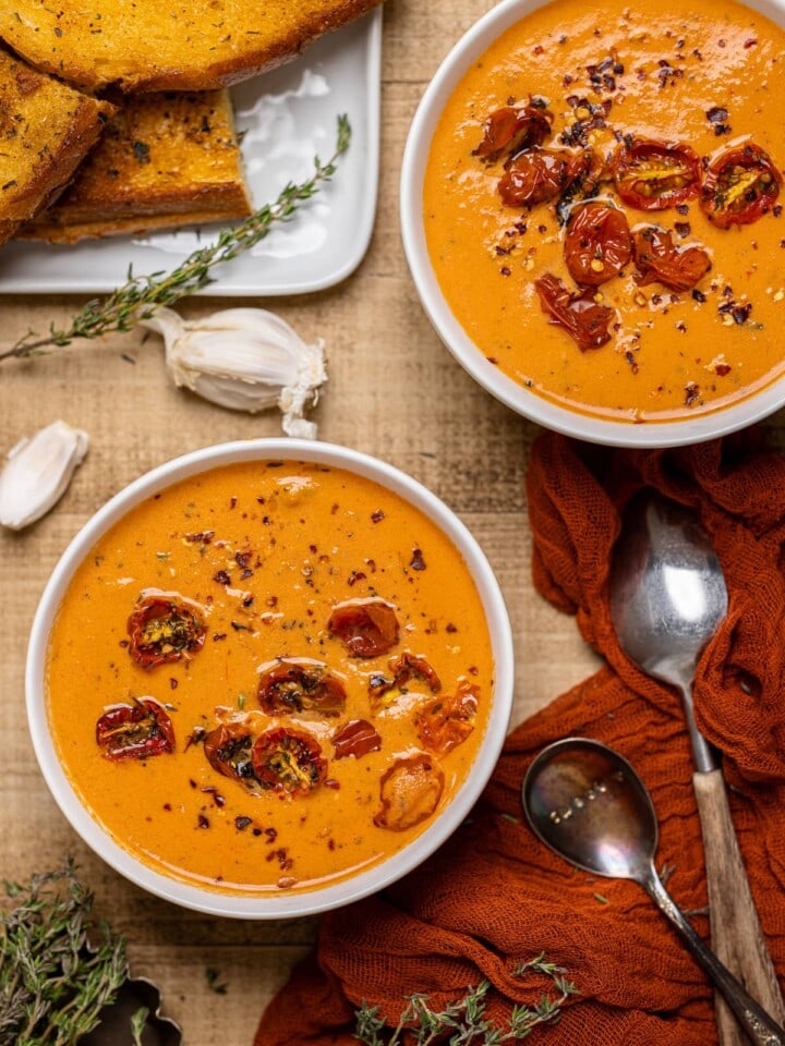 Two bowls of Creamy Roasted Garlic Tomato Soup