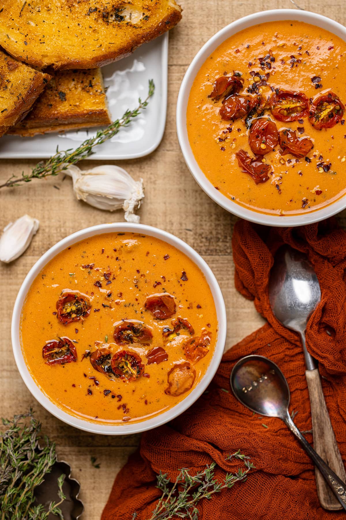 Two bowls of Creamy Roasted Garlic Tomato Soup