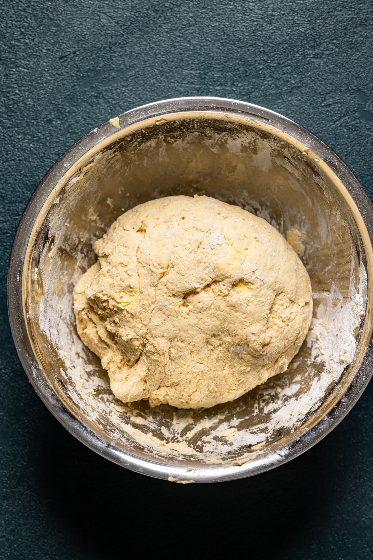 Ball of Flaky Sweet Potato Biscuit dough in a bowl