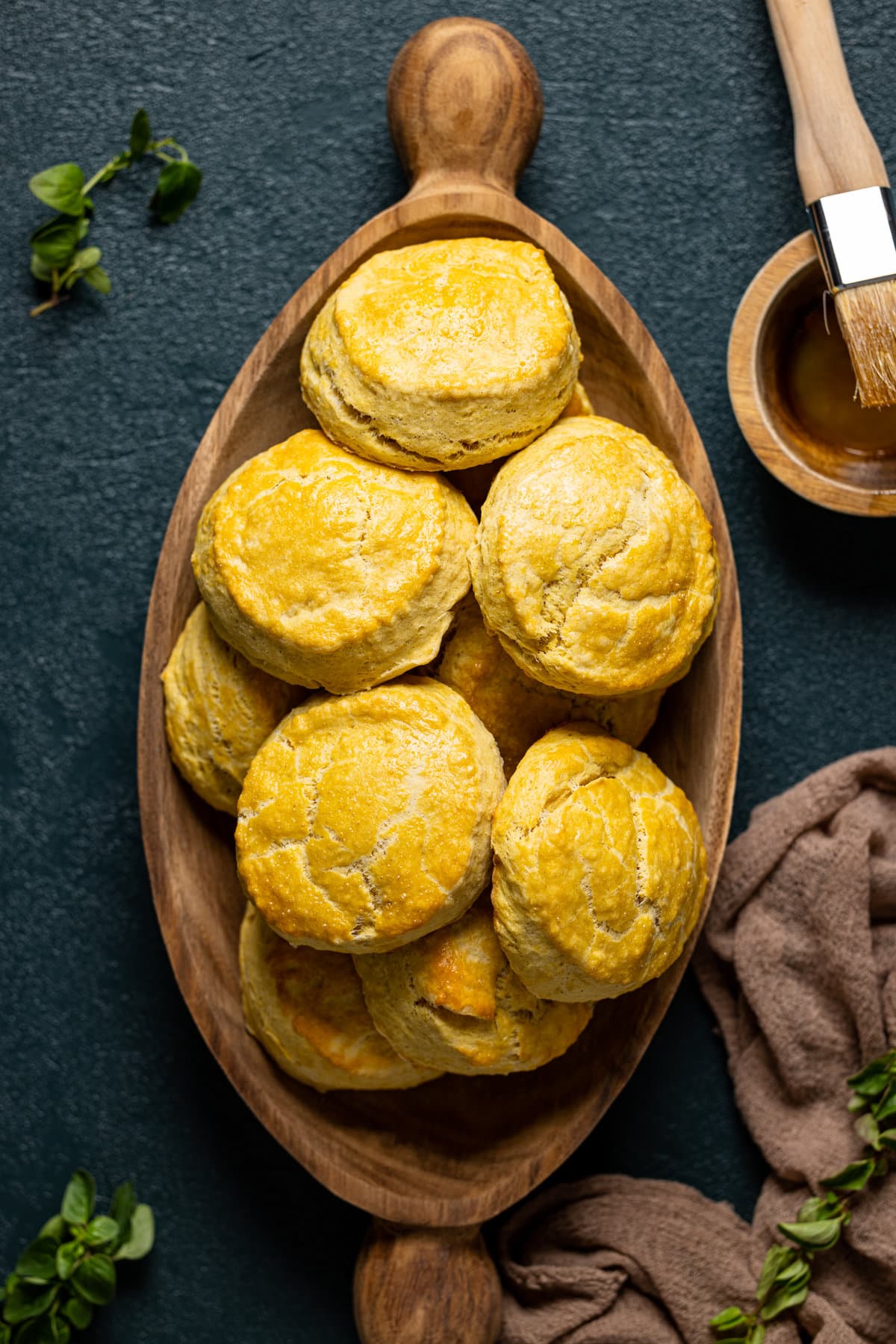 Wooden bowl of Flaky Sweet Potato Biscuits 