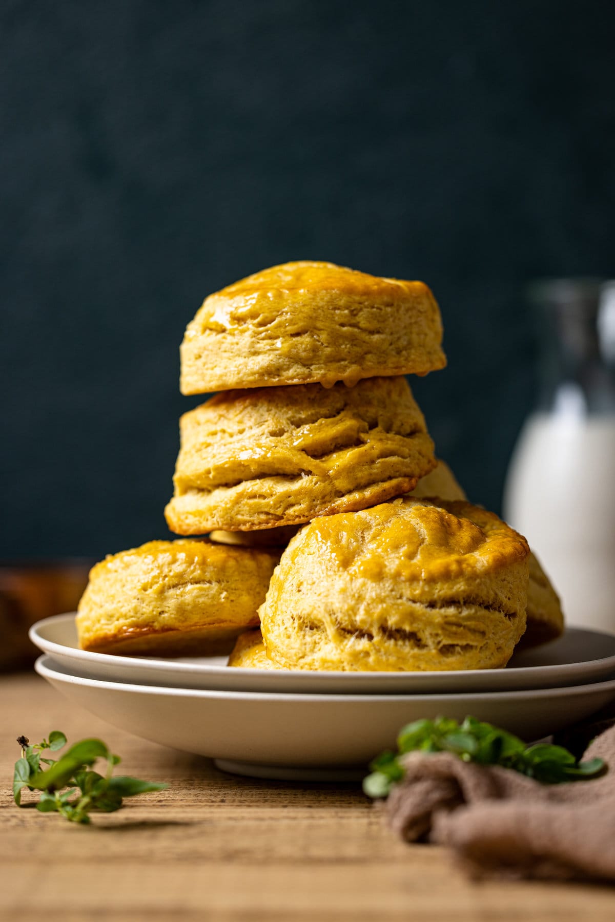 Stack of Flaky Sweet Potato Biscuits on two plates