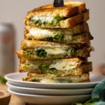Closeup of a stack of Broccoli Pesto Grilled Cheese sandwiches