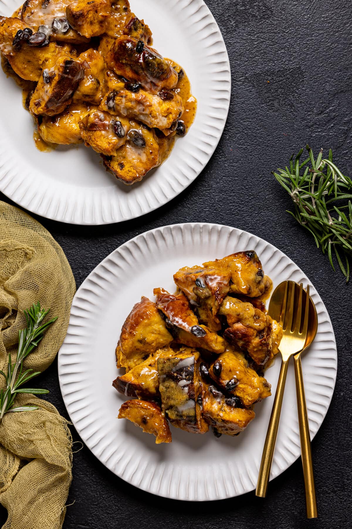 Two plates of Deconstructed Vegan Sweet Potato Bread Pudding