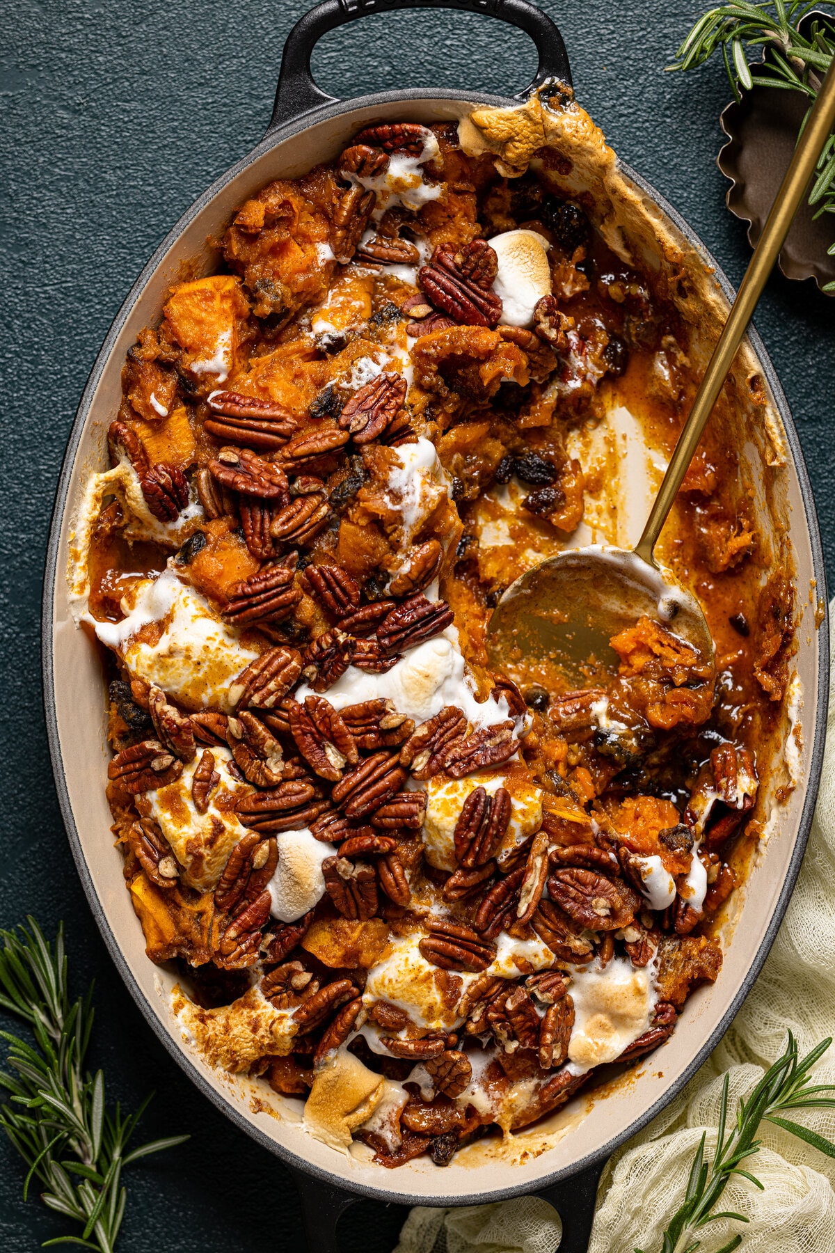 Serving spoon scooping Maple Sweet Potato Casserole