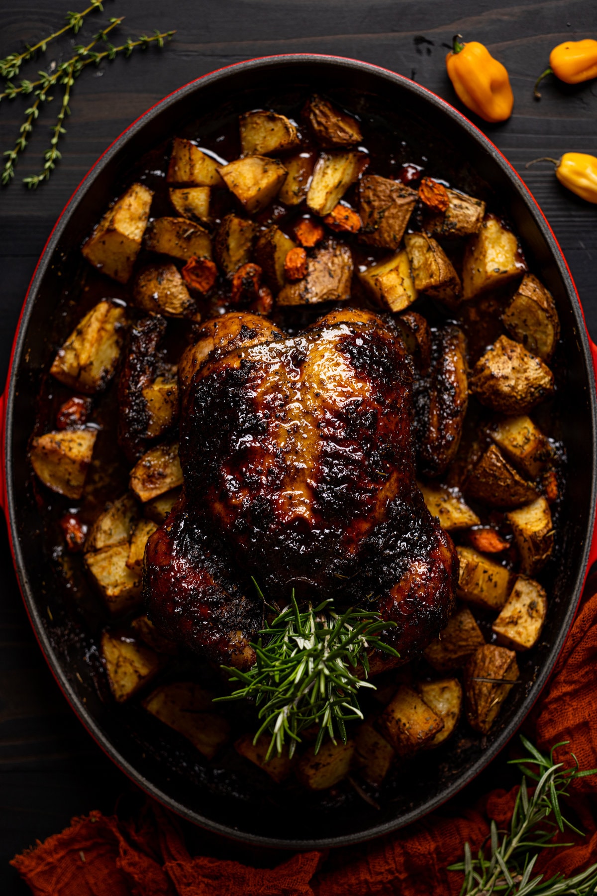 Cooked, seasoned chicken surrounded by chopped vegetables