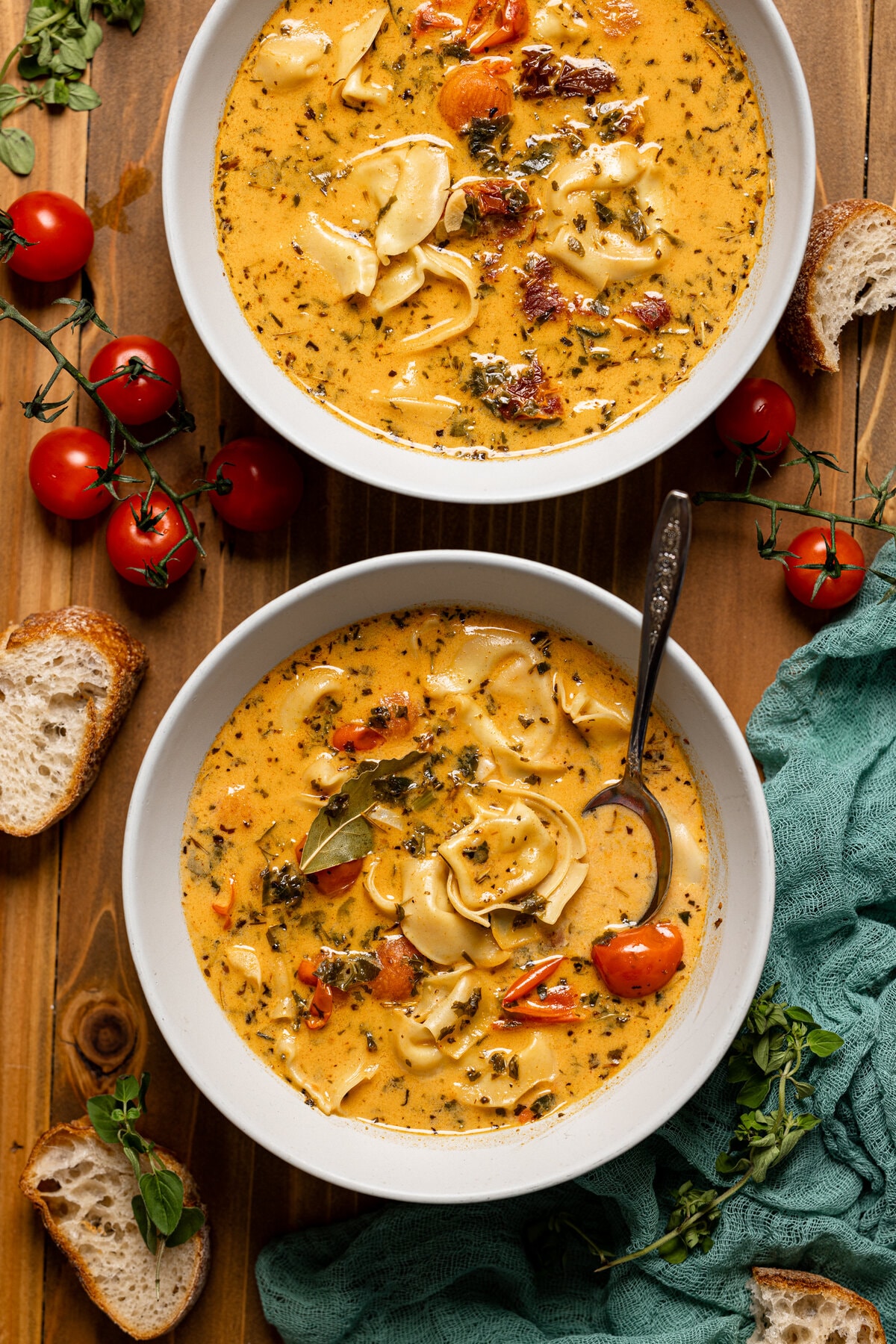 Two bowls of Creamy Tuscan Tortellini Soup