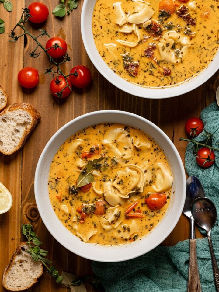 Two bowls of Creamy Tuscan Tortellini Soup