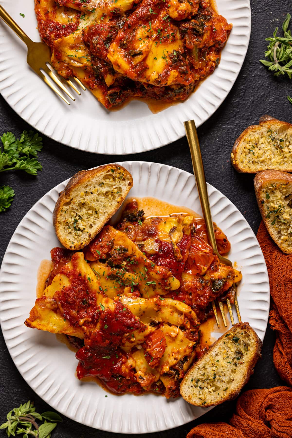 Plates of Tomato Kale Ravioli Bake