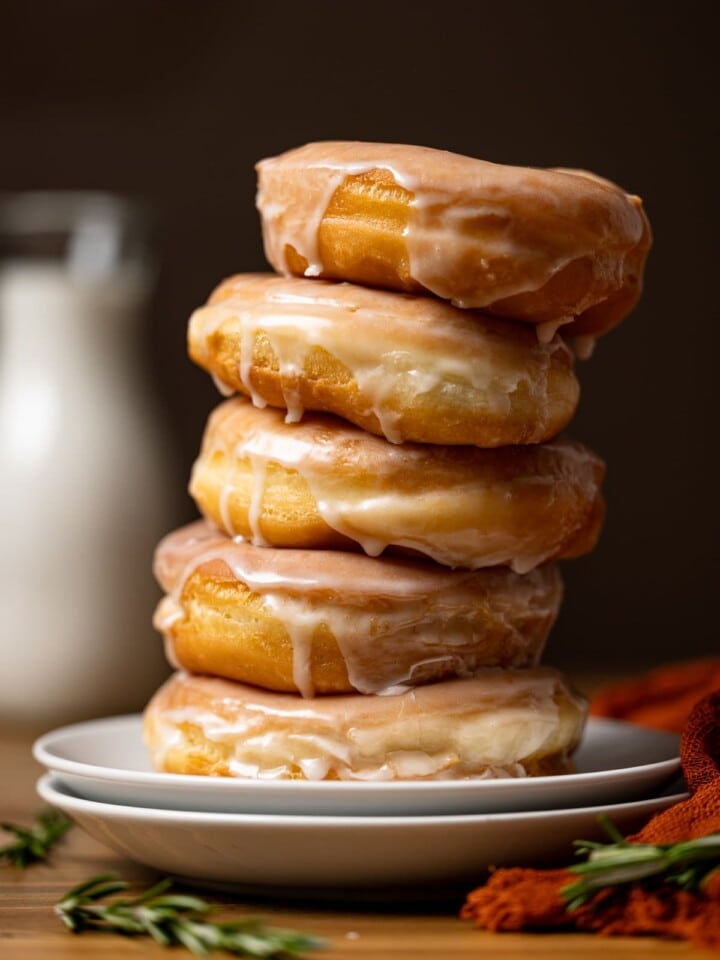 Leaning stack of Homemade Classic Glazed Doughnuts