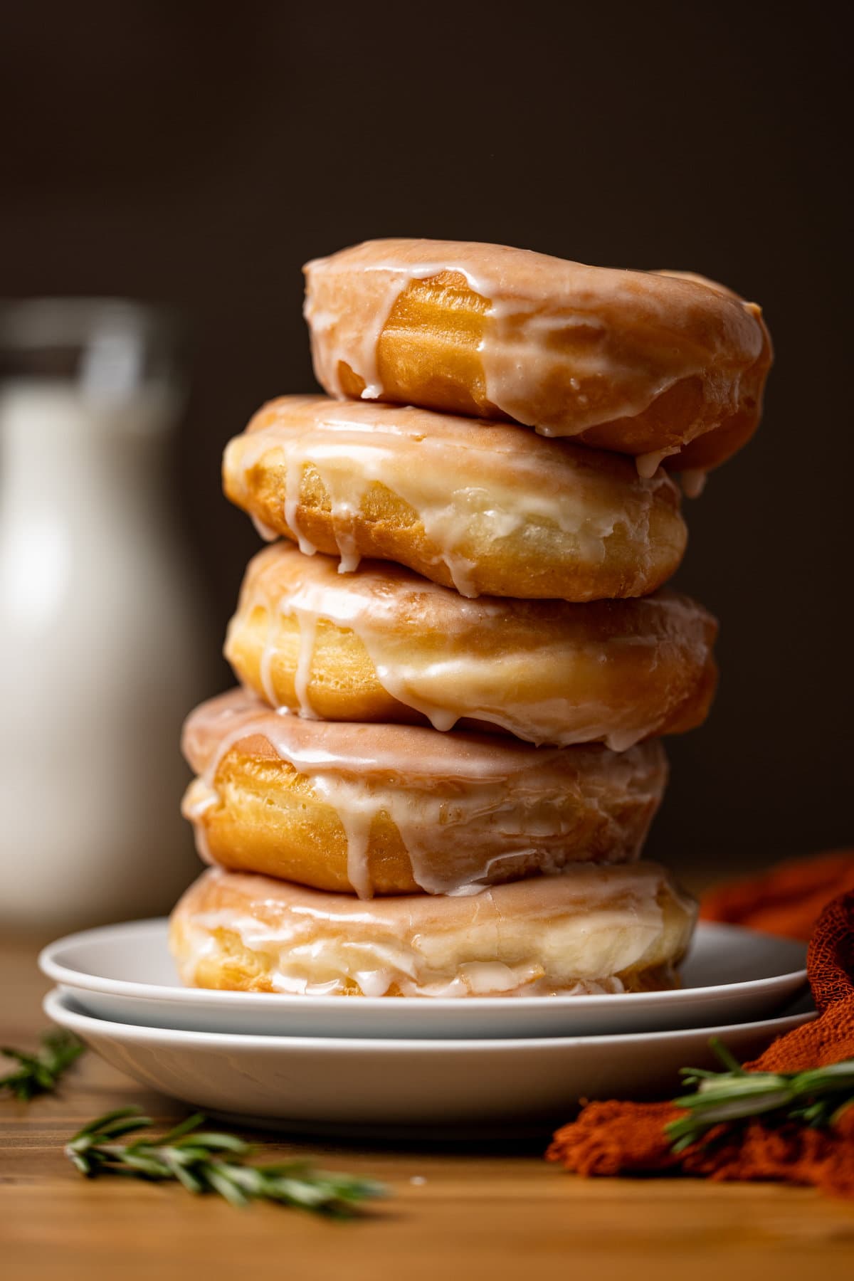 Leaning stack of Homemade Classic Glazed Doughnuts