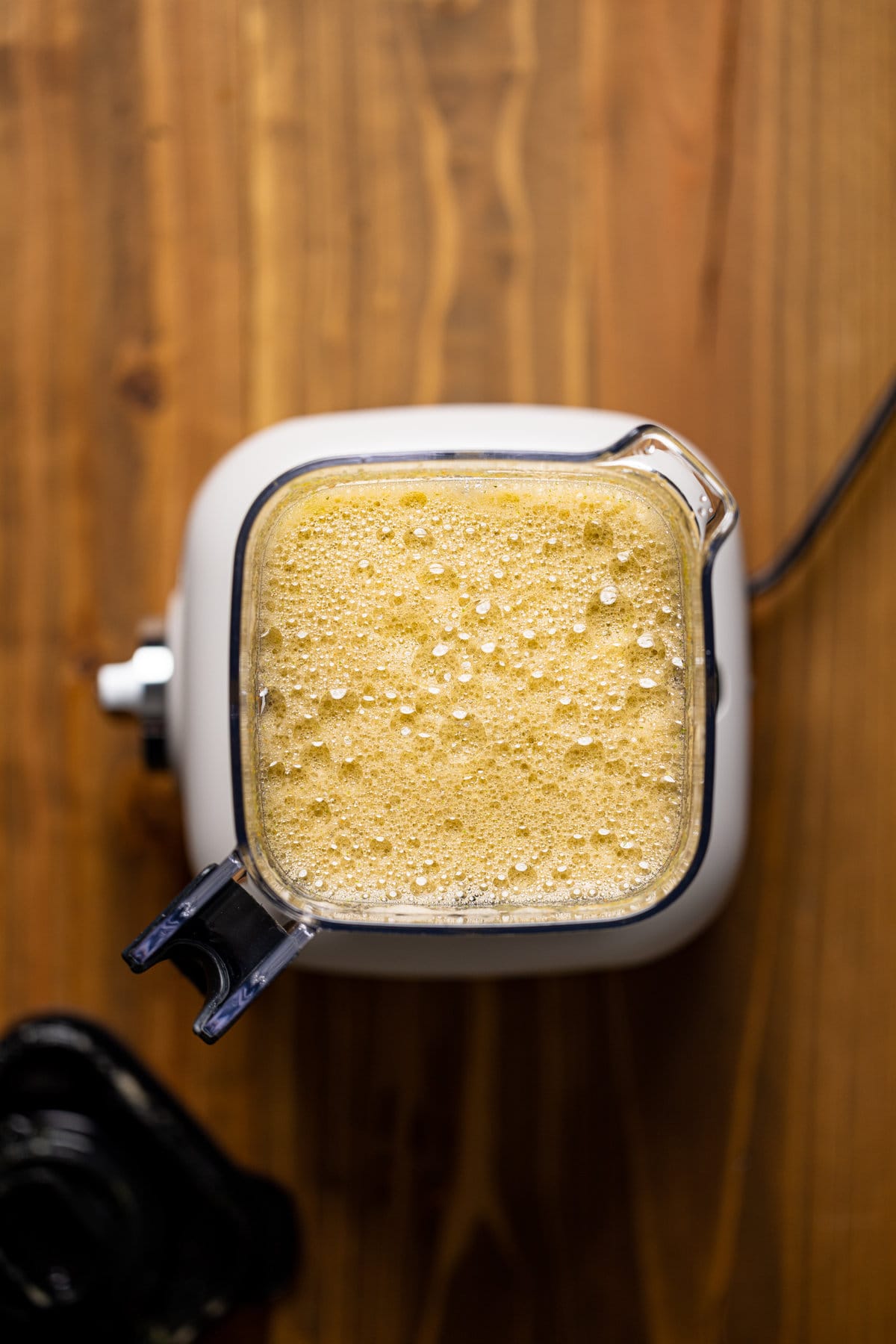 Overhead shot of Cleansing Sugar Detox Juice in a blender