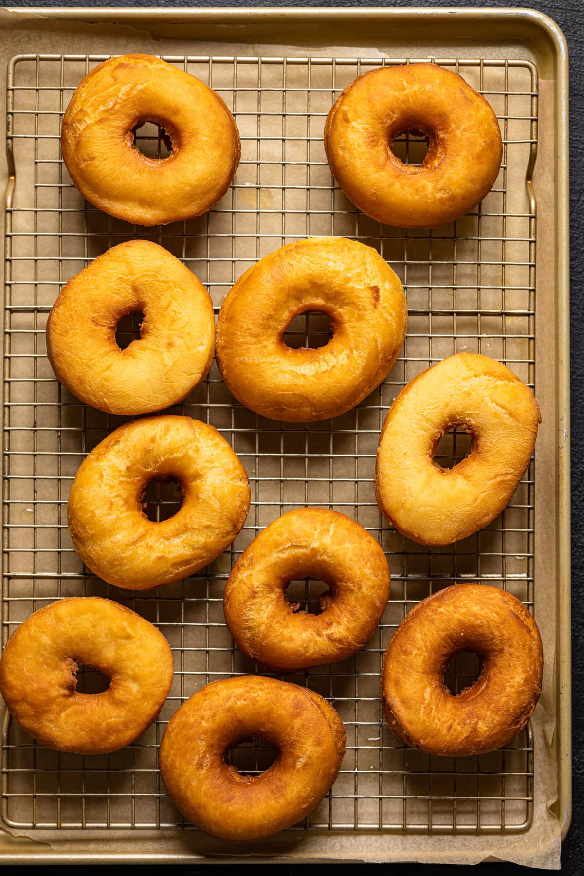 Lemon Blueberry Doughnuts on a wire rack