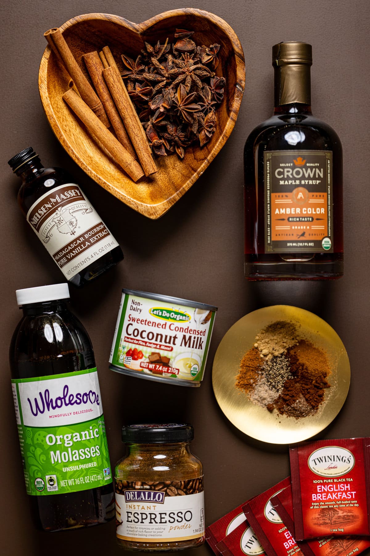 Ingredients for Dirty Chai Martini Mocktail including coconut milk, molasses, and maple syrup