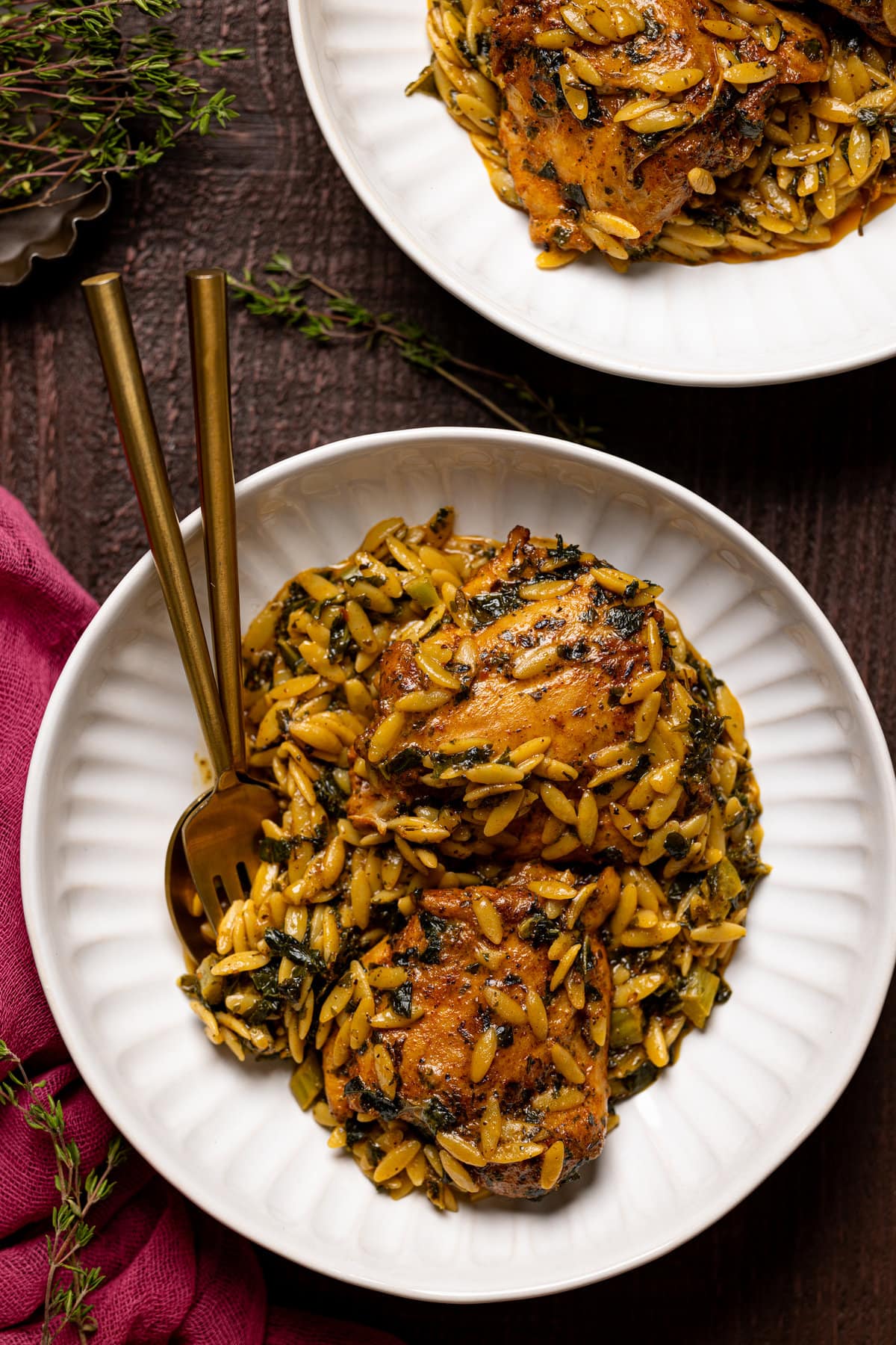 Creamy Cajun Chicken Orzo on a plate with silverware