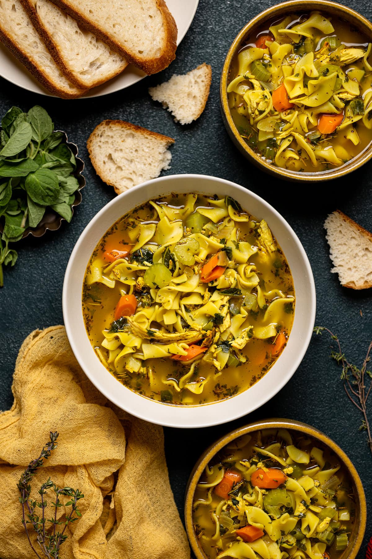 Three bowls of Nourishing Chicken Noodle Soup