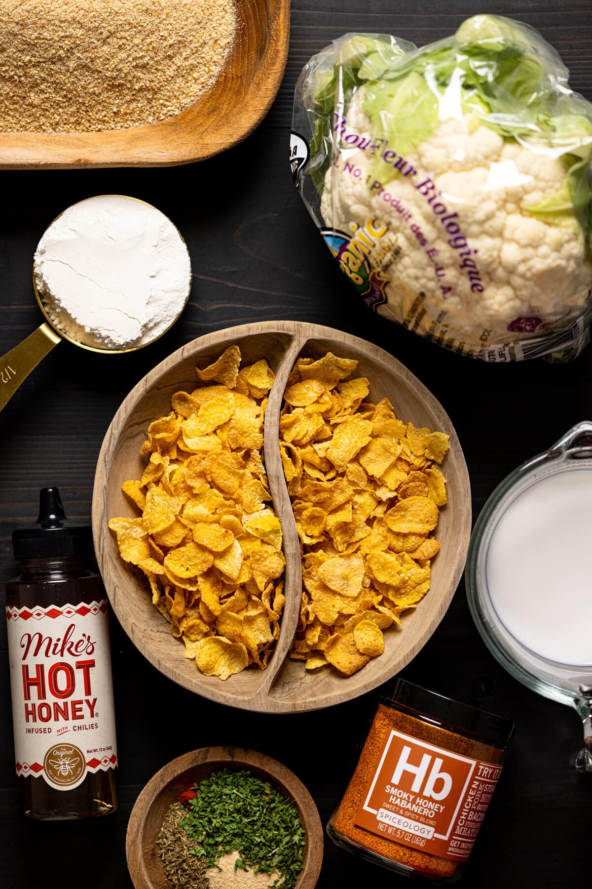 Ingredients for Nashville Hot Cauliflower with Kale Grits including Mike\'s Hot Honey, cauliflower, and smoky honey habanero