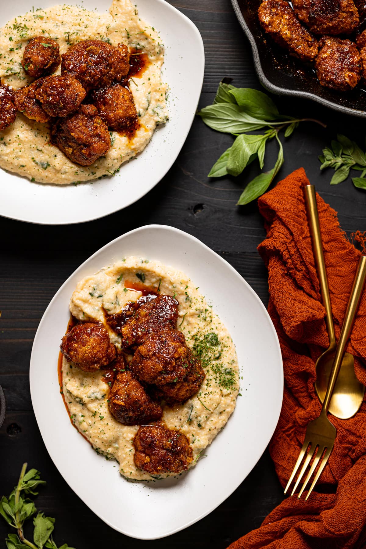 Overhead shot of a plate of Nashville Hot Cauliflower with Kale Grits