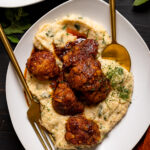 Plate of Nashville Hot Cauliflower with Kale Grits