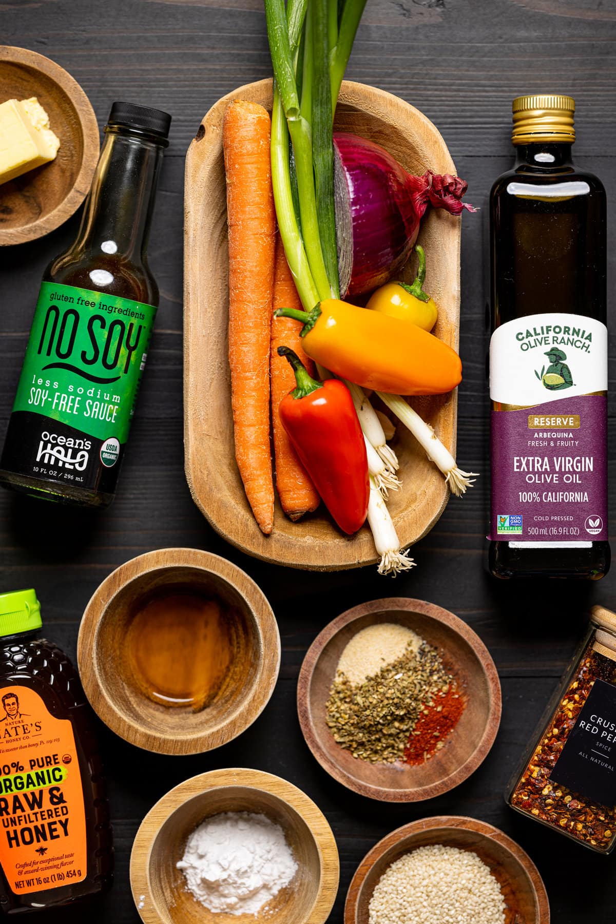 Ingredients for Date Night Healthy Shrimp Lo Mein including olive oil, vegetables, soy-free sauce, and spices