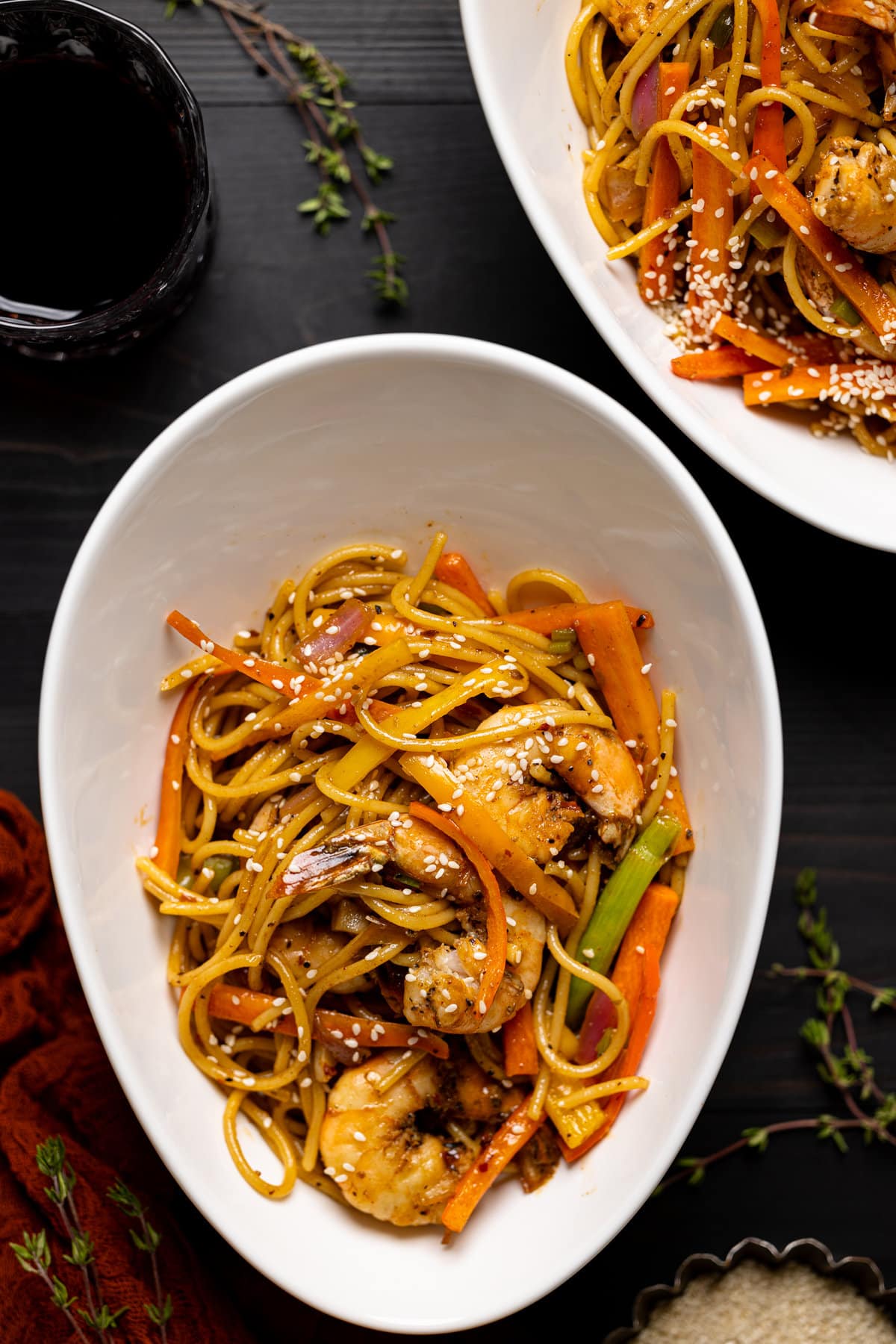 Bowl of Shrimp Lo Mein sprinkled with sesame seeds