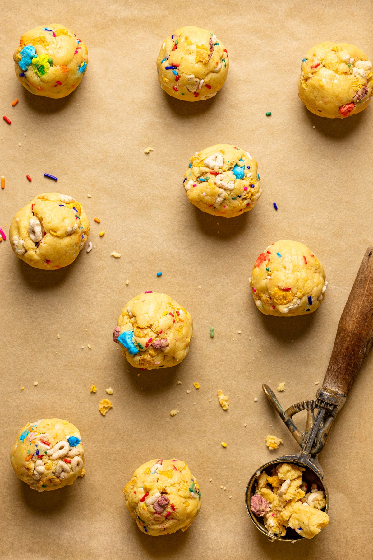 Balls of Loaded Lucky Charms Cornflakes Sugar Cookie dough