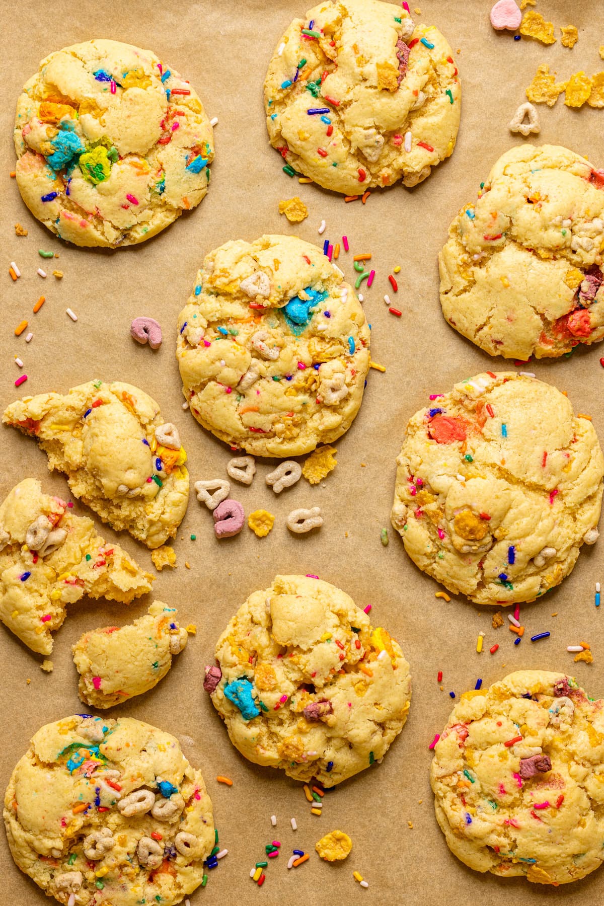 Loaded Lucky Charms Cornflakes Sugar Cookies on parchment paper