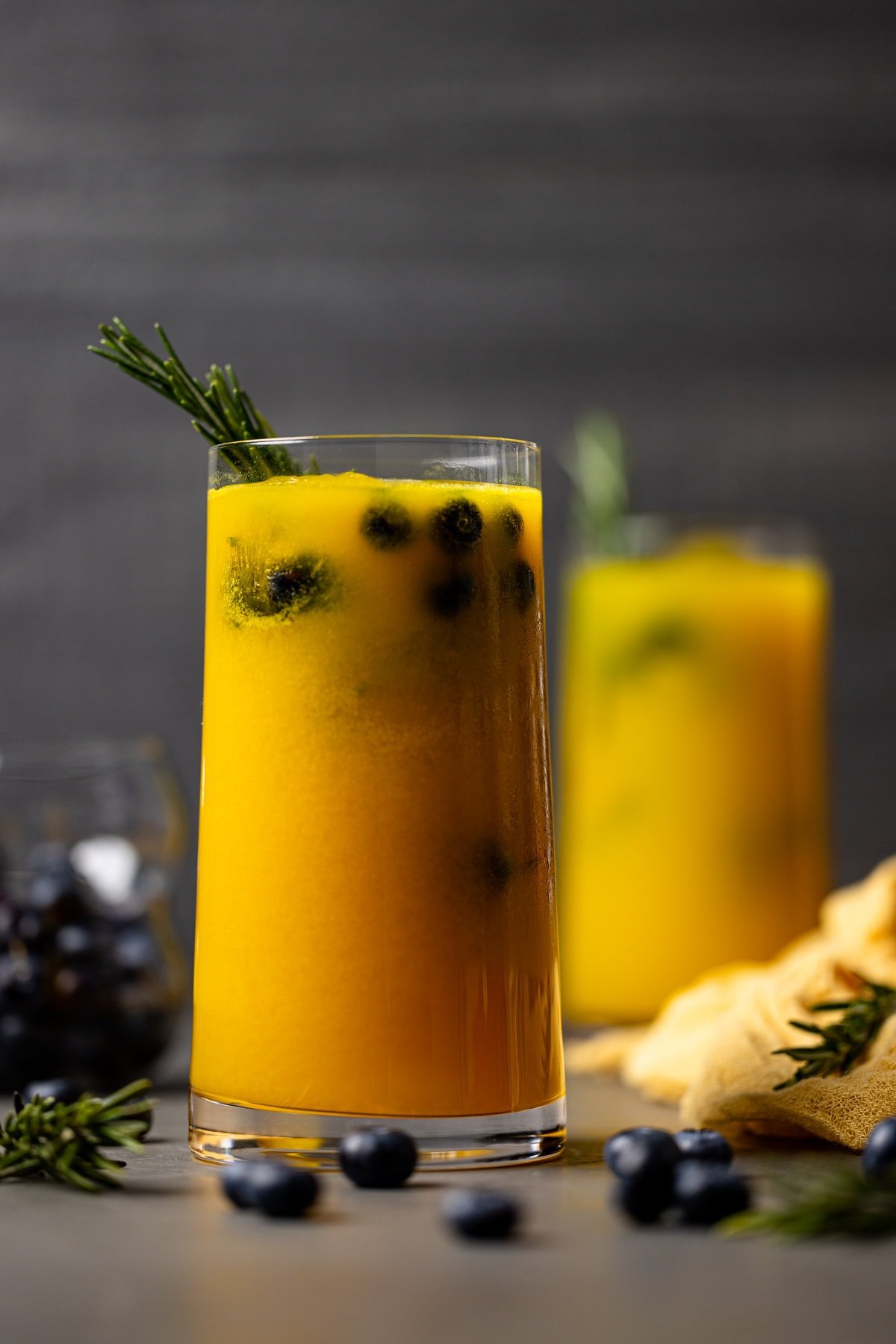 Mango Lemonade Kombucha Mocktail with blueberries
