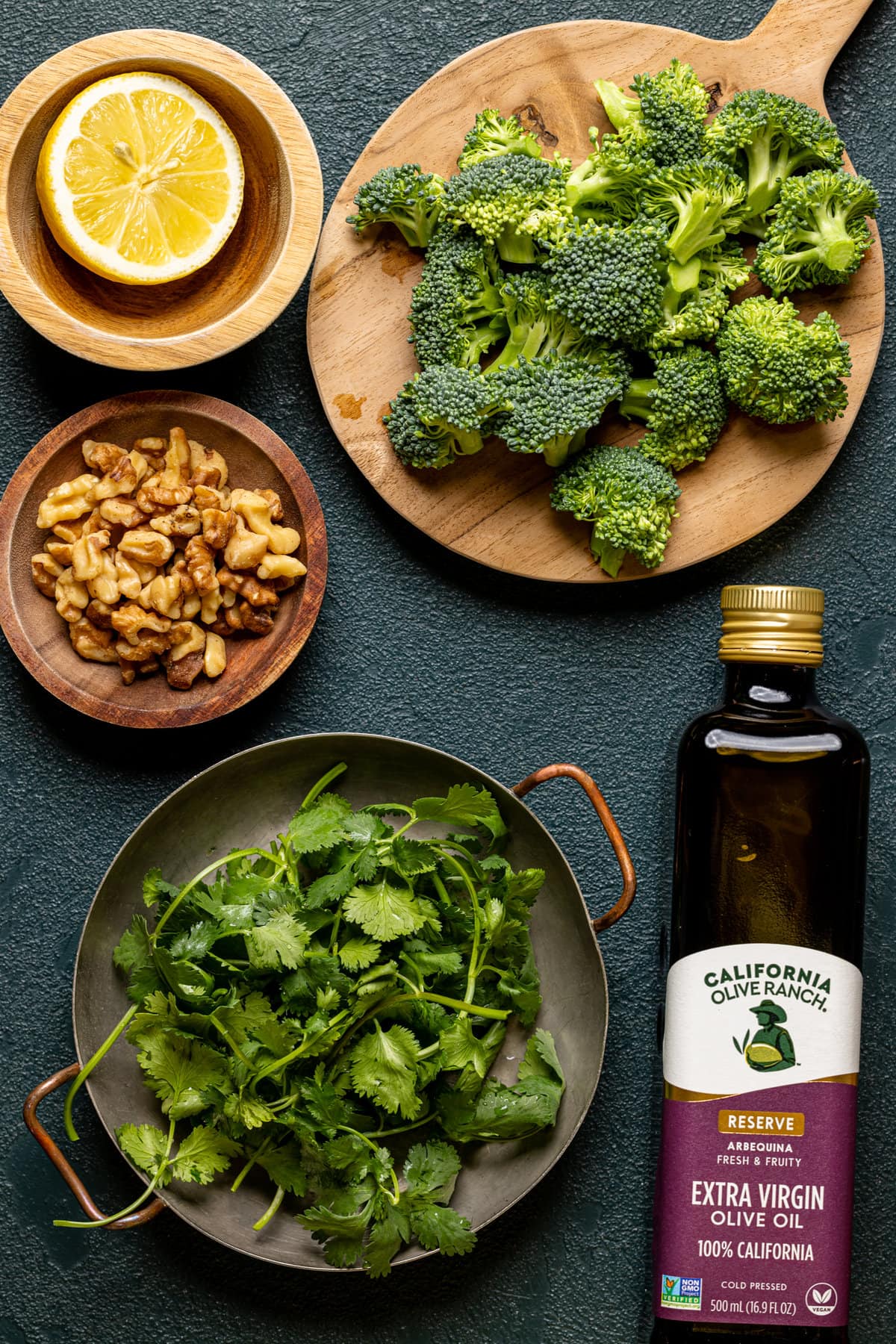 Ingredients for Broccoli Pesto Gnocchi with Chickpeas including broccoli, olive oil, and lemon