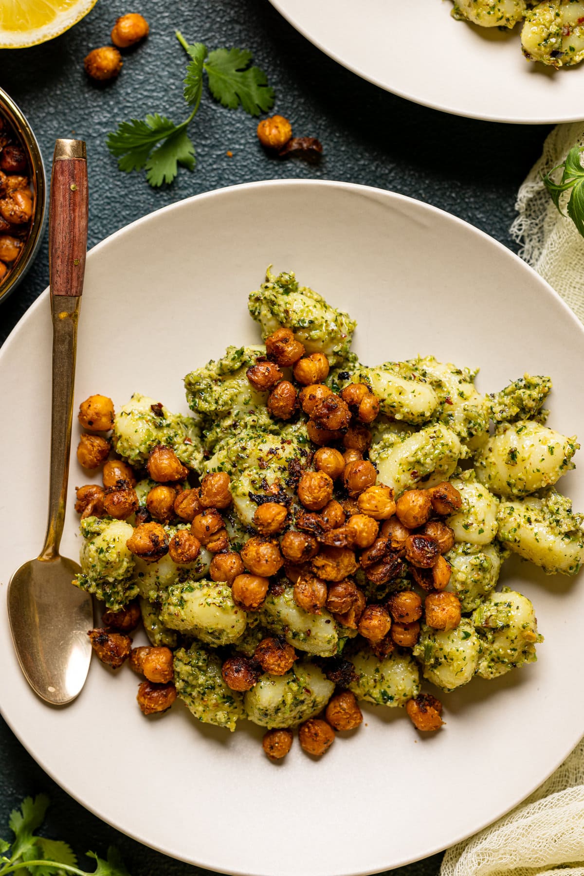 Plate of broccoli pesto gnocchi with chickpeas