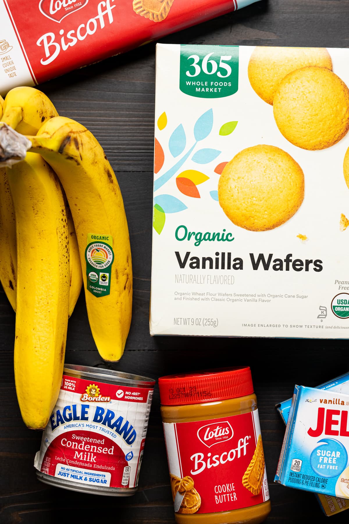 Ingredients for The Best Biscoff Banana Pudding with Caramel, including Vanilla Wafers, bananas, peanut butter, and sweetened condensed milk