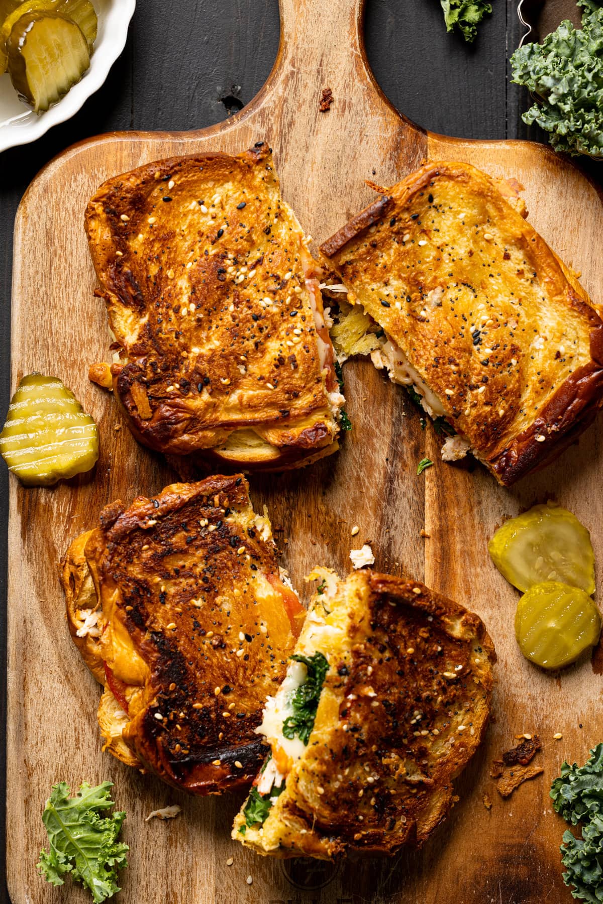 Closeup of two Everything Chicken Tomato Grilled Cheeses