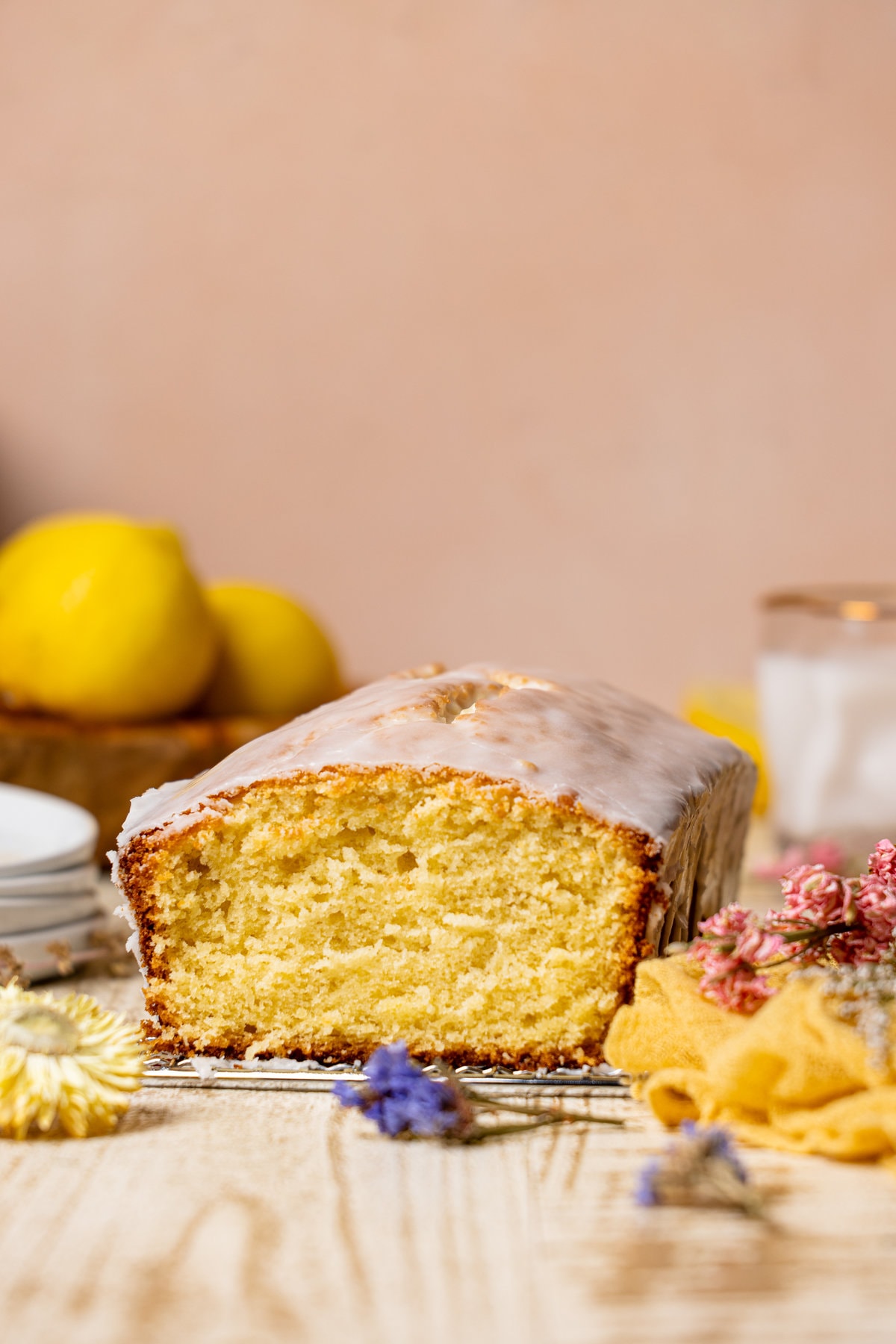 Loaf of Iced Lemon Loaf Pound Cake with a slice taken off