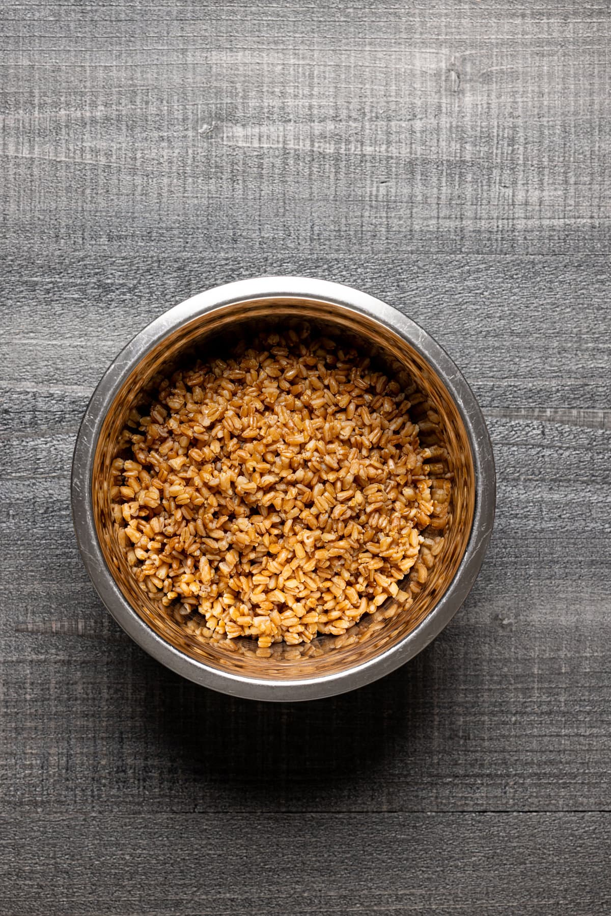 Metal bowl of farro