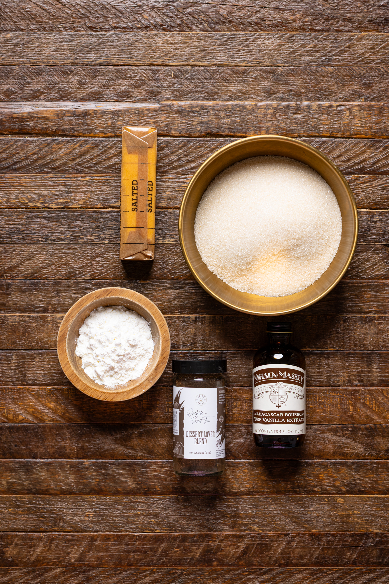 Image of ingredients on a brown wood table.