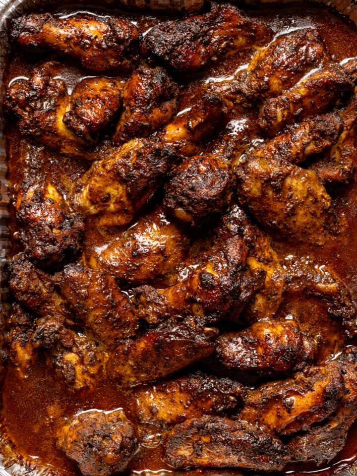Closeup of baked chicken wings up.