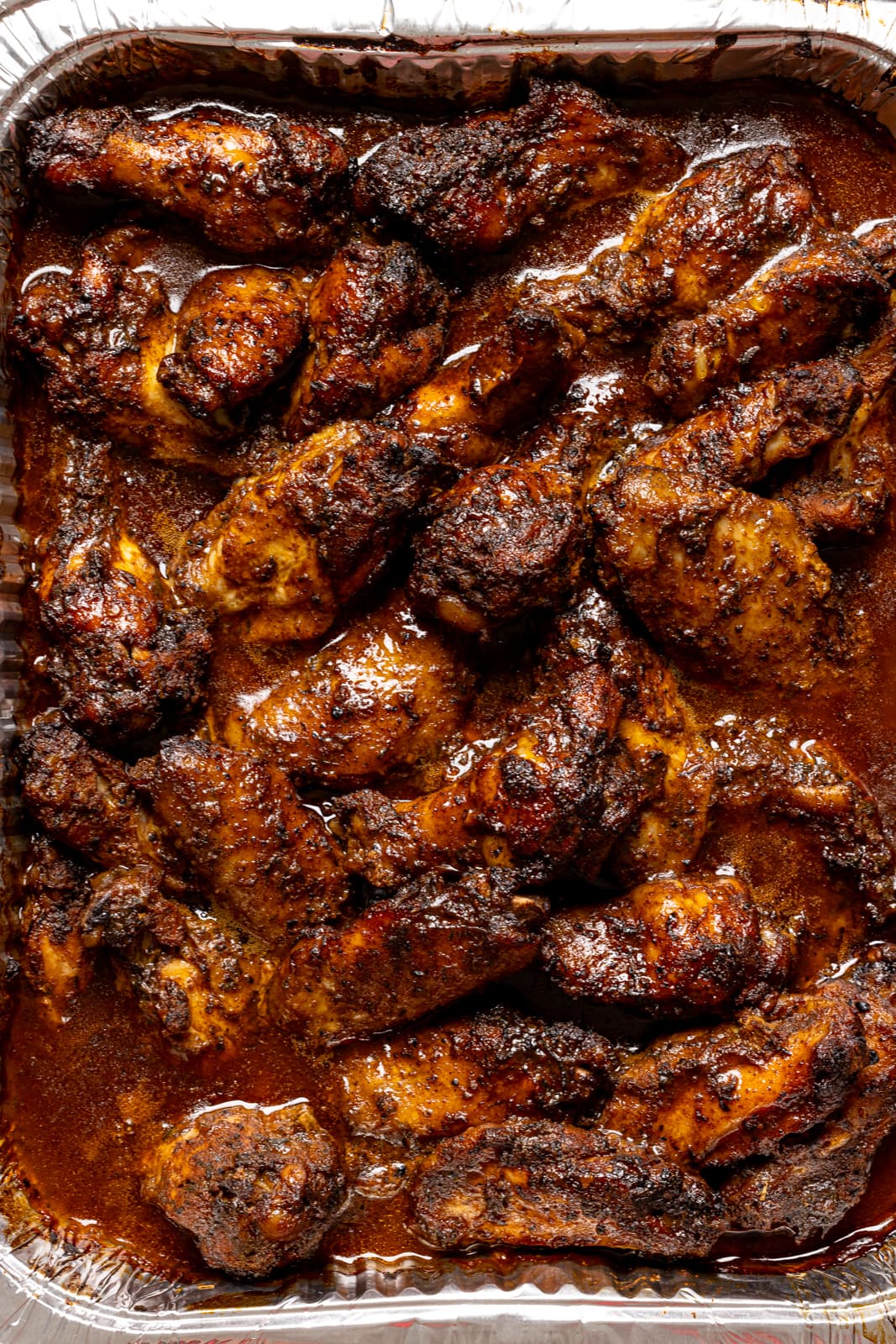 Closeup of baked chicken wings up.