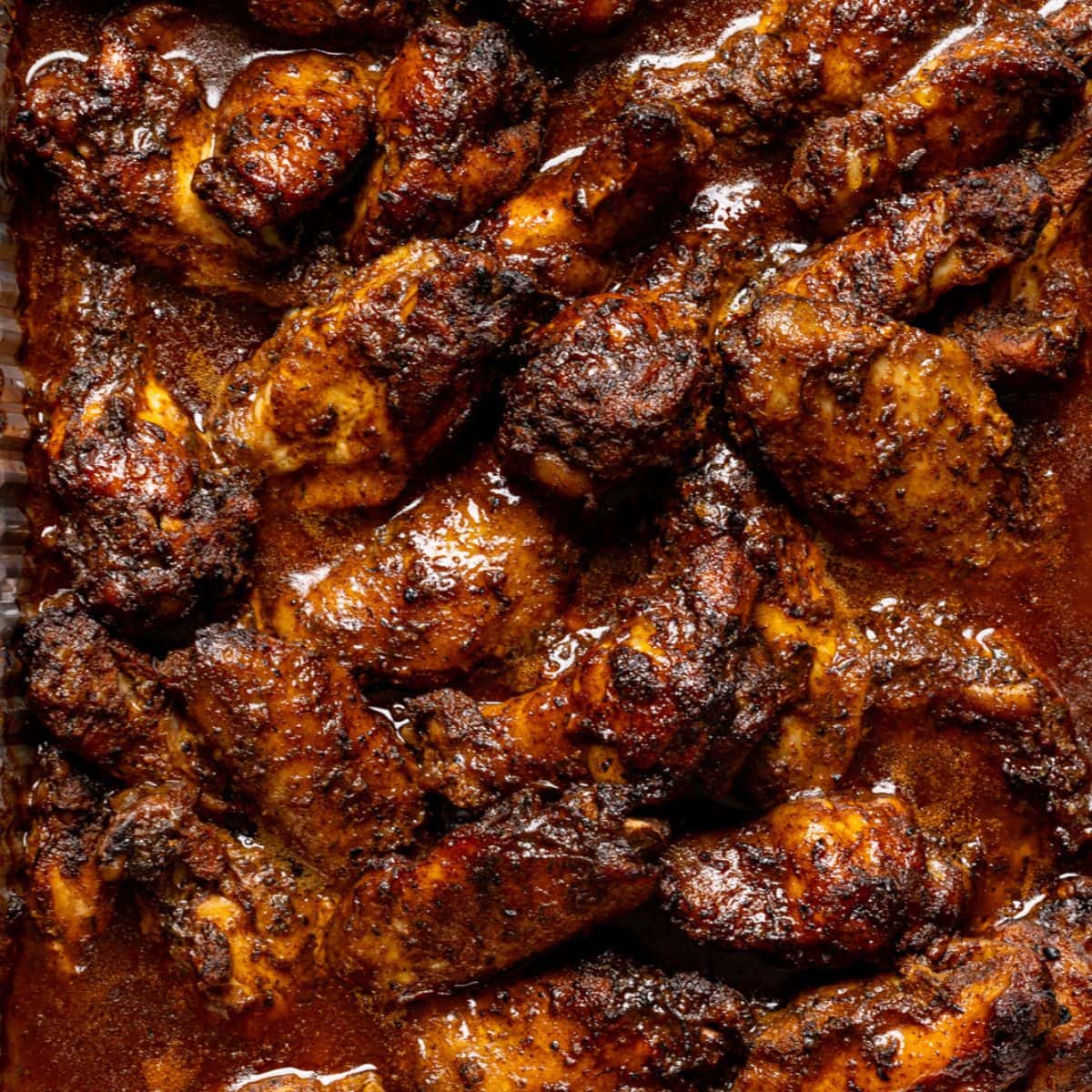 Baked chicken wings up close.