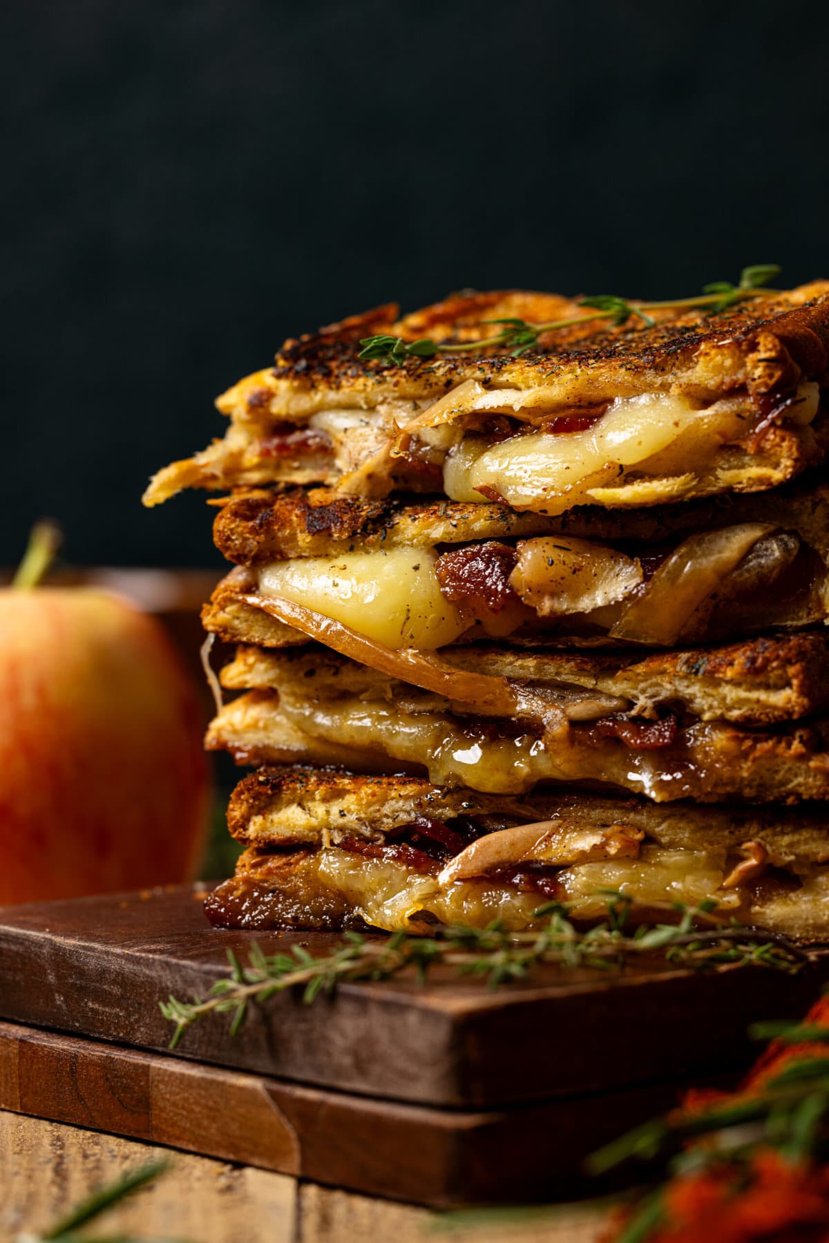 Up close shot of grilled cheese sandwiches as a stack.