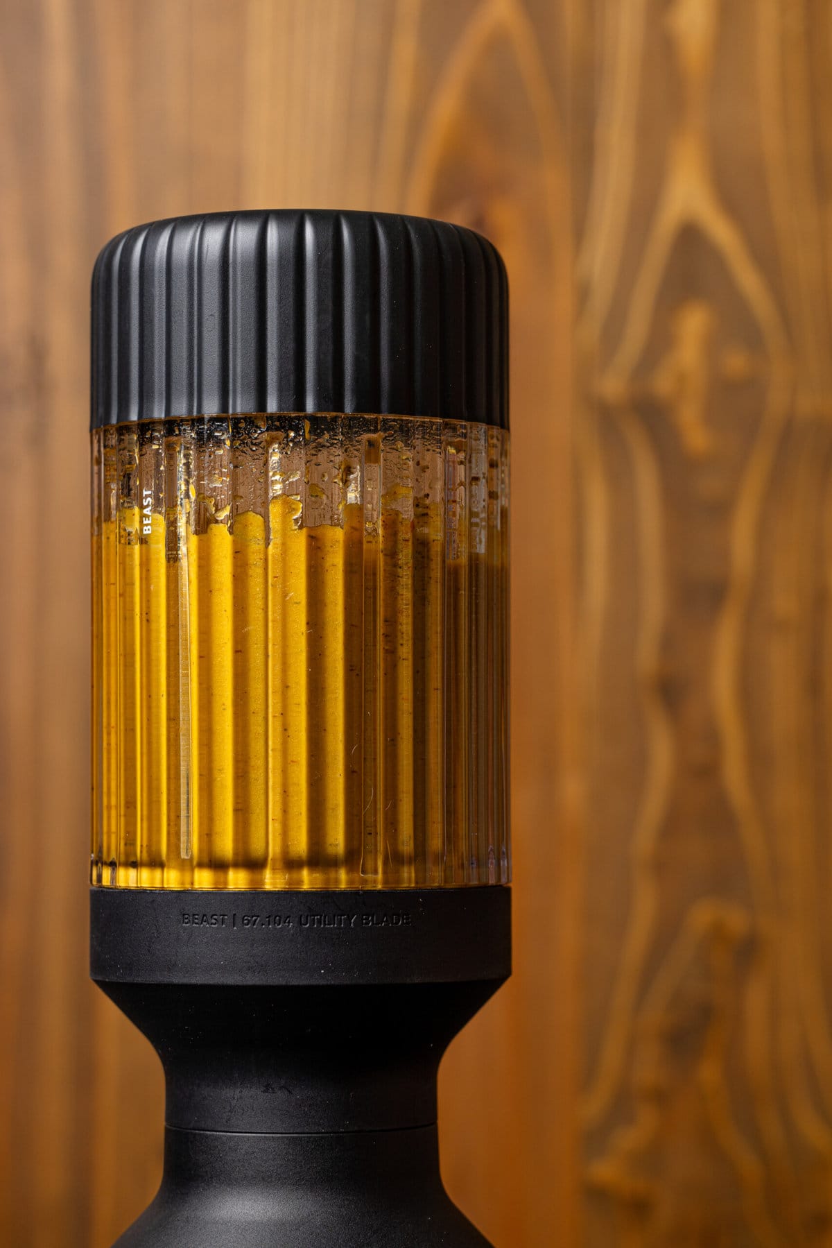 Creamy pasta sauce in a black blender. 
