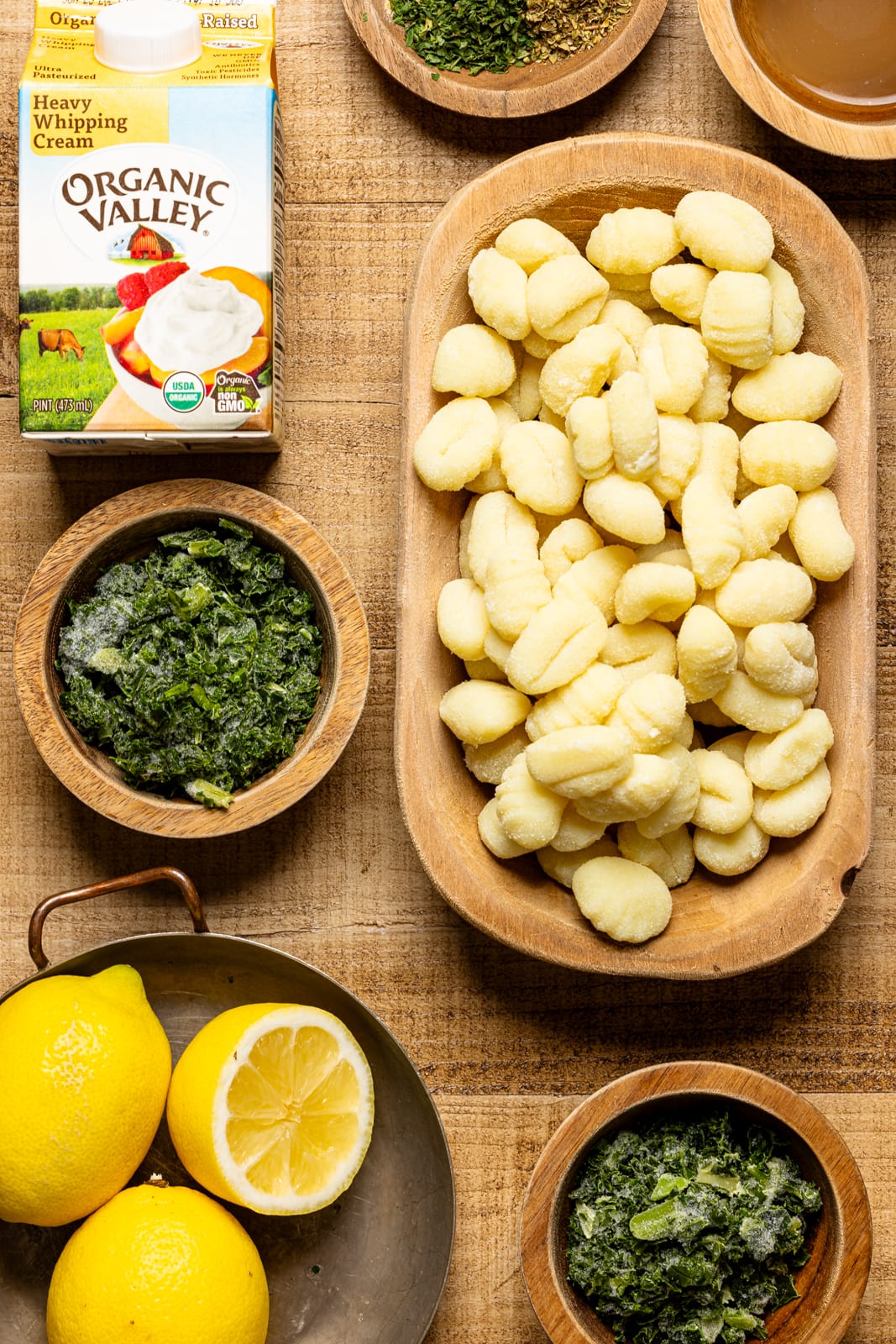 Ingredients on a brown wood table.