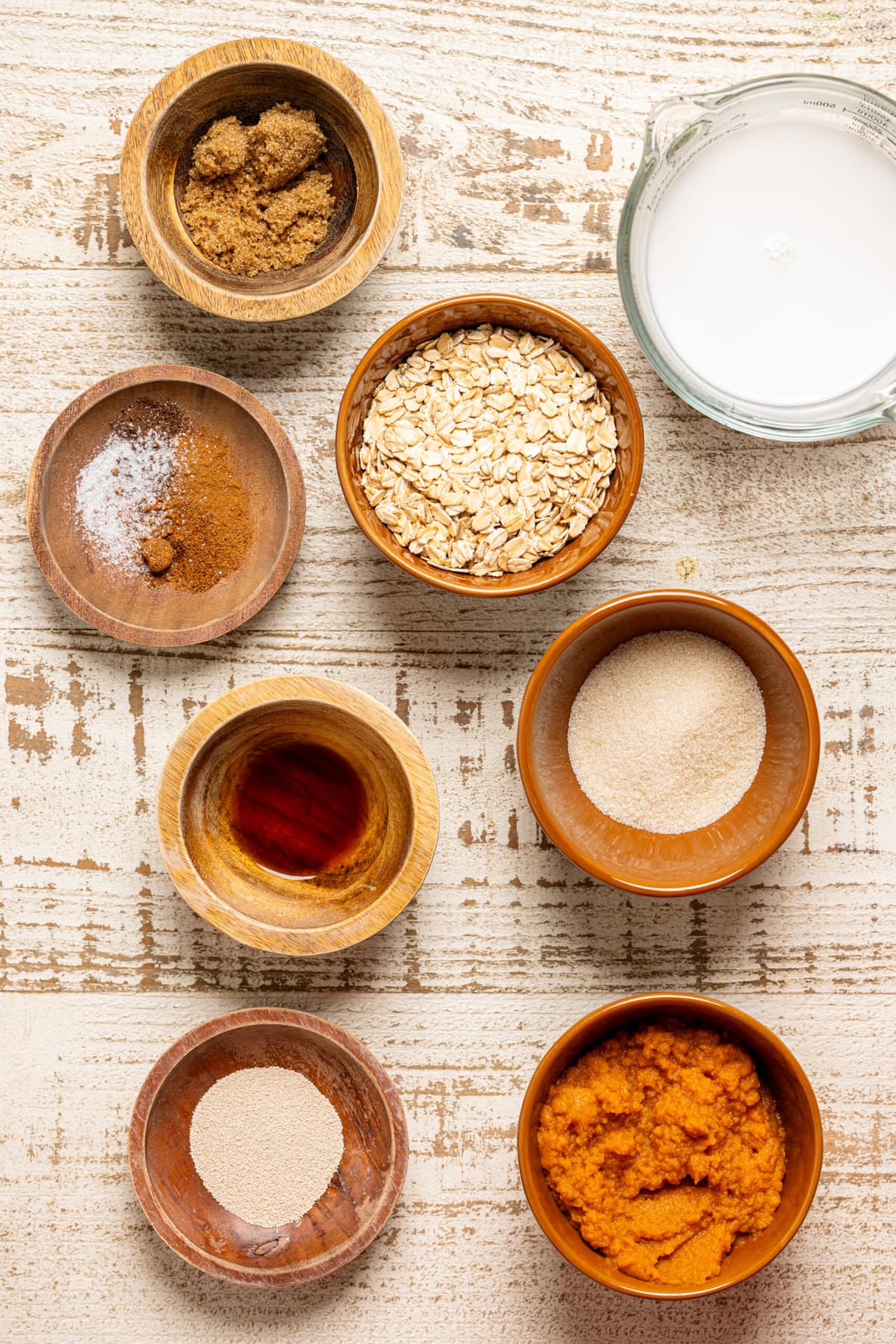 Ingredients on a white wood table.