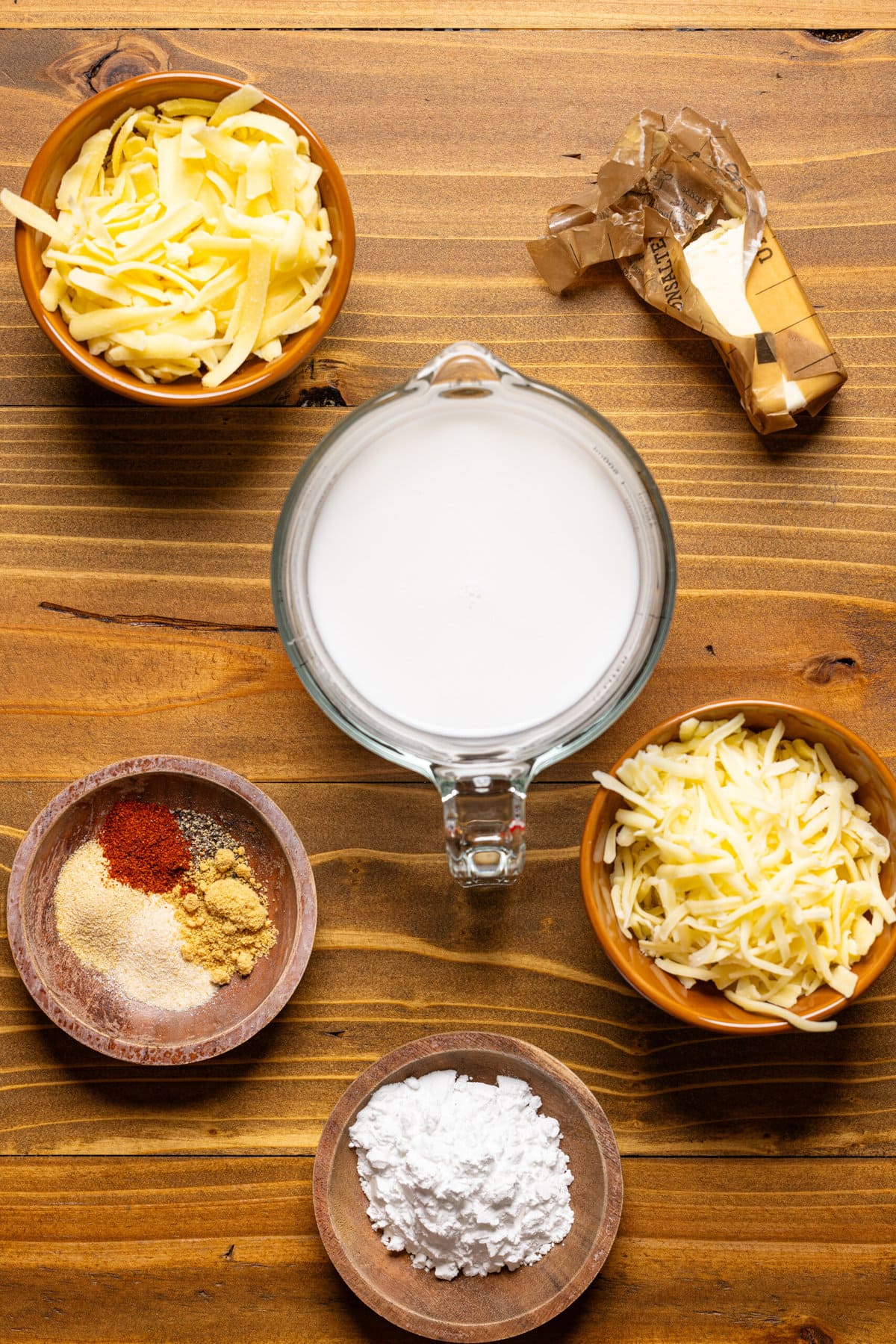 Ingredients on a brown wood table.