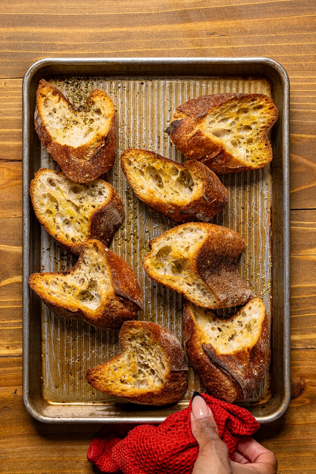 Toasted bread on a baking sheet.