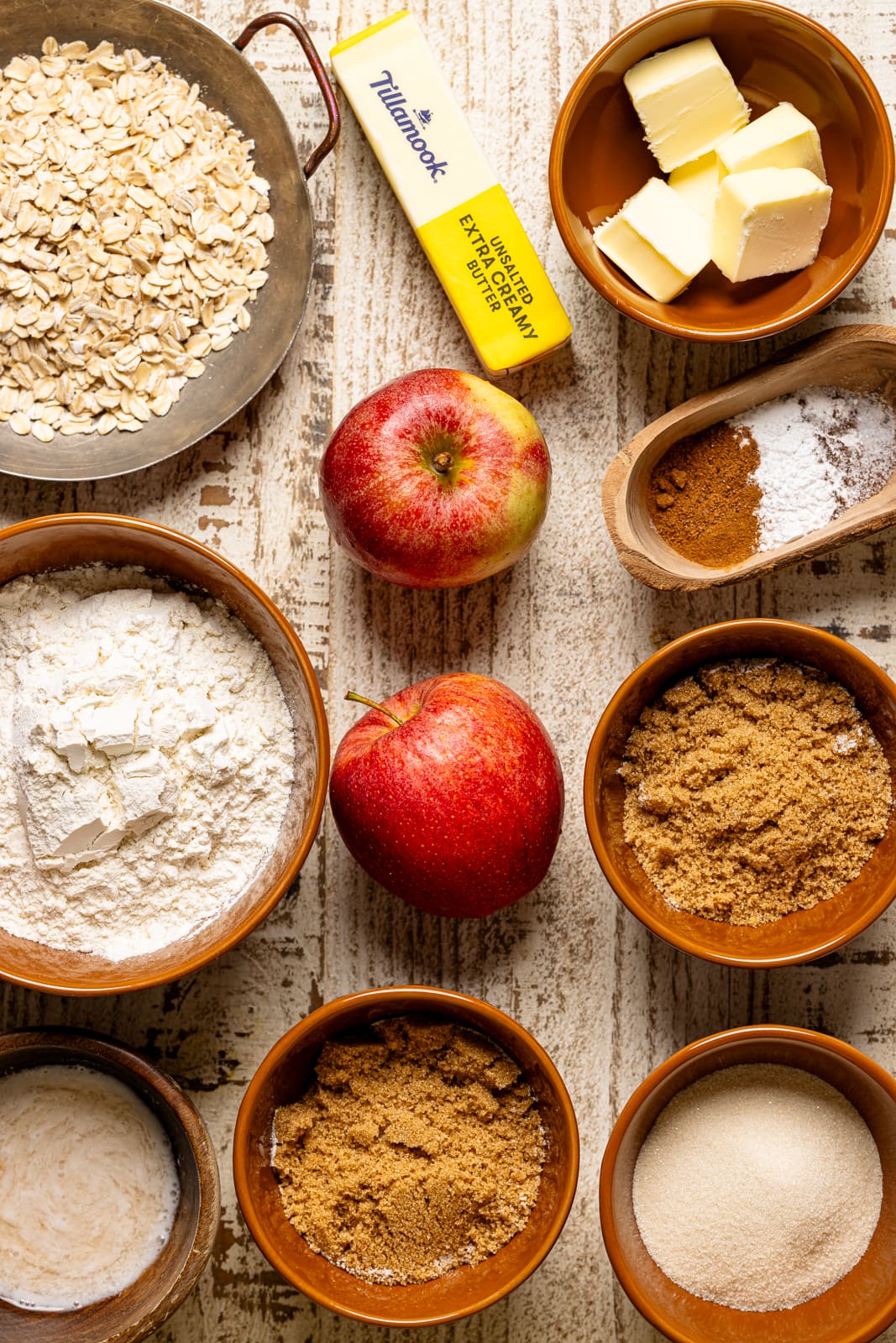 Ingredients on a white wood table.