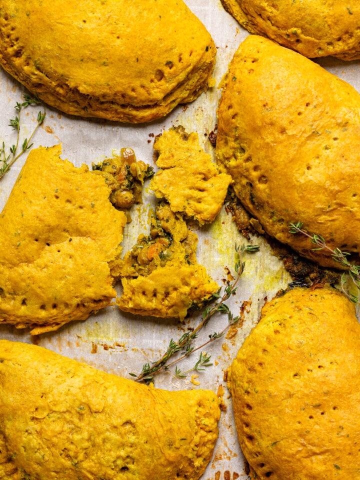 Baked patties on a baking sheet.