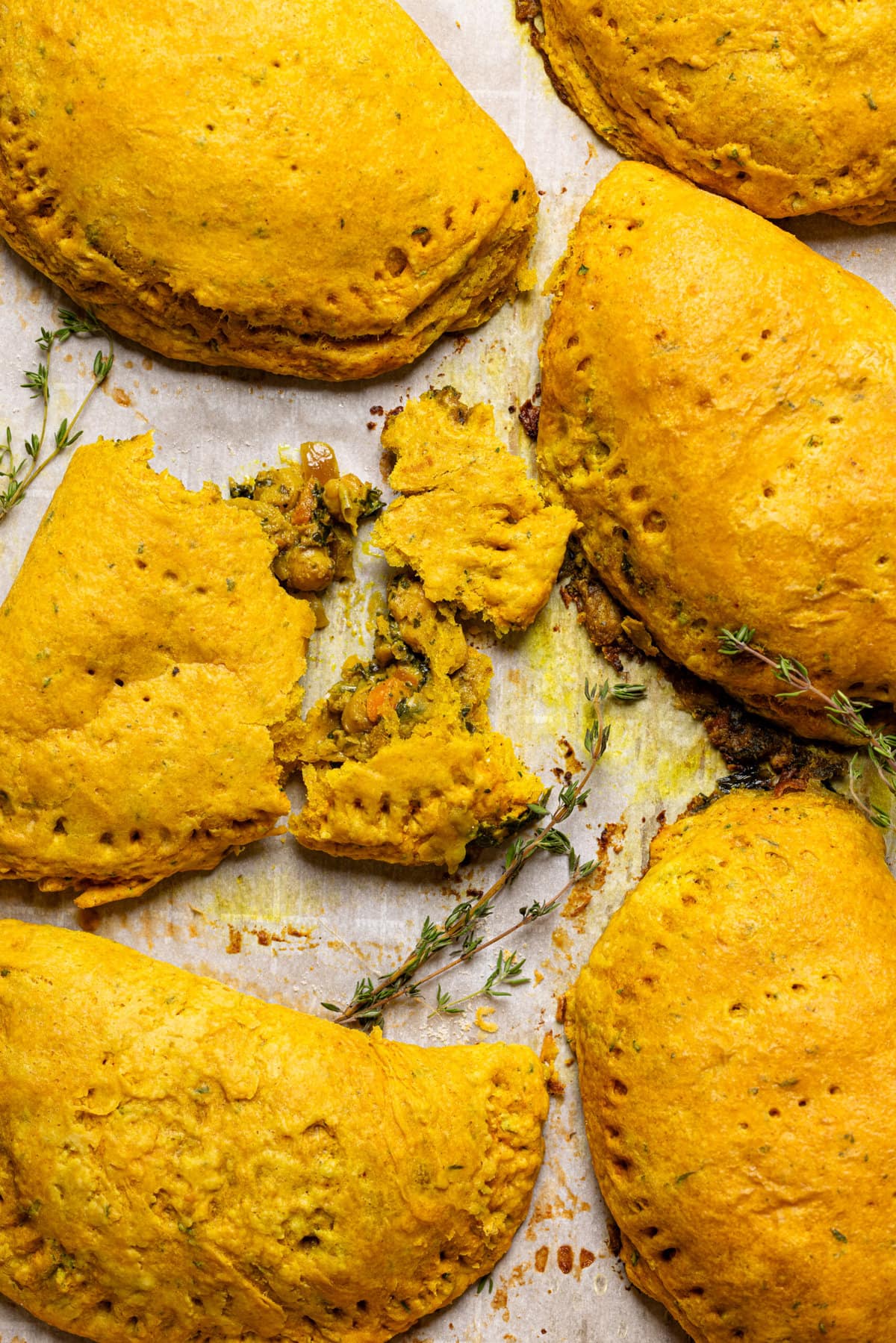 Baked patties on a baking sheet.