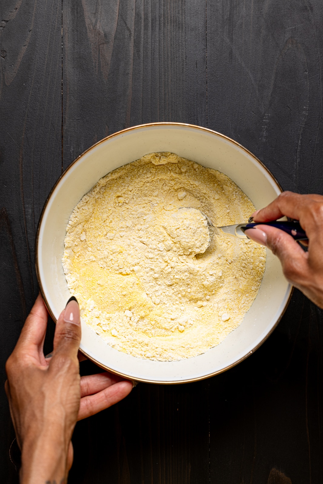 Dry ingredients mixed together in a white bowl.