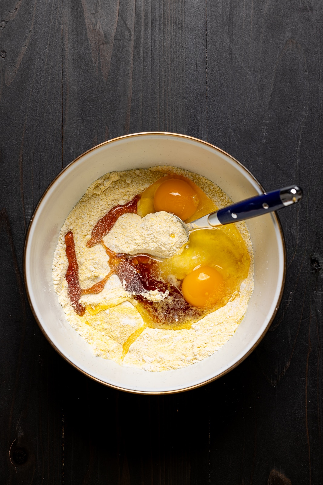 All ingredients in a white bowl with a spoon.