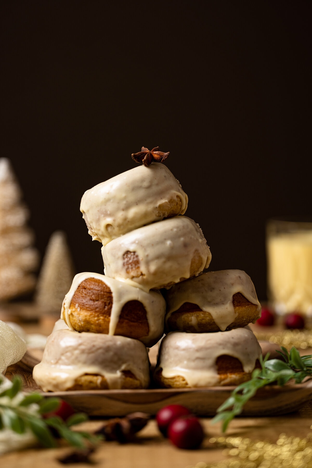 Donuts stacked a top each other with festive holiday decor.